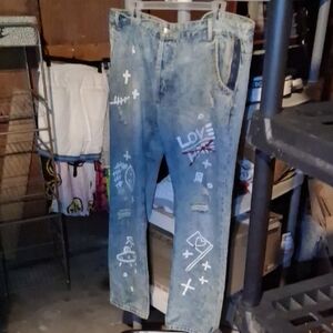 Men's Artistic Blue Jeans with Graphic Accents